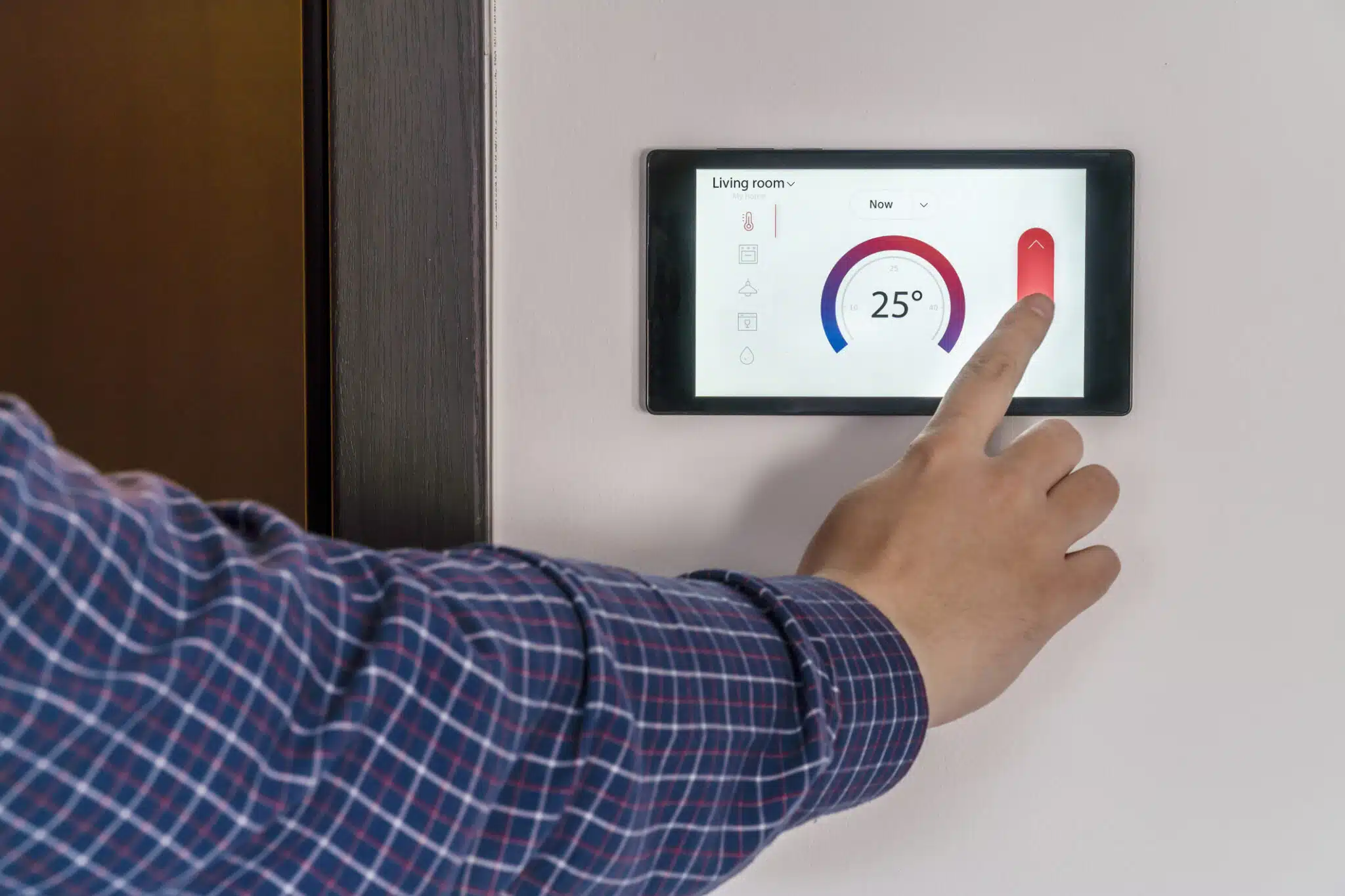 Smart home climate control device on a wall, Smart Thermostats.