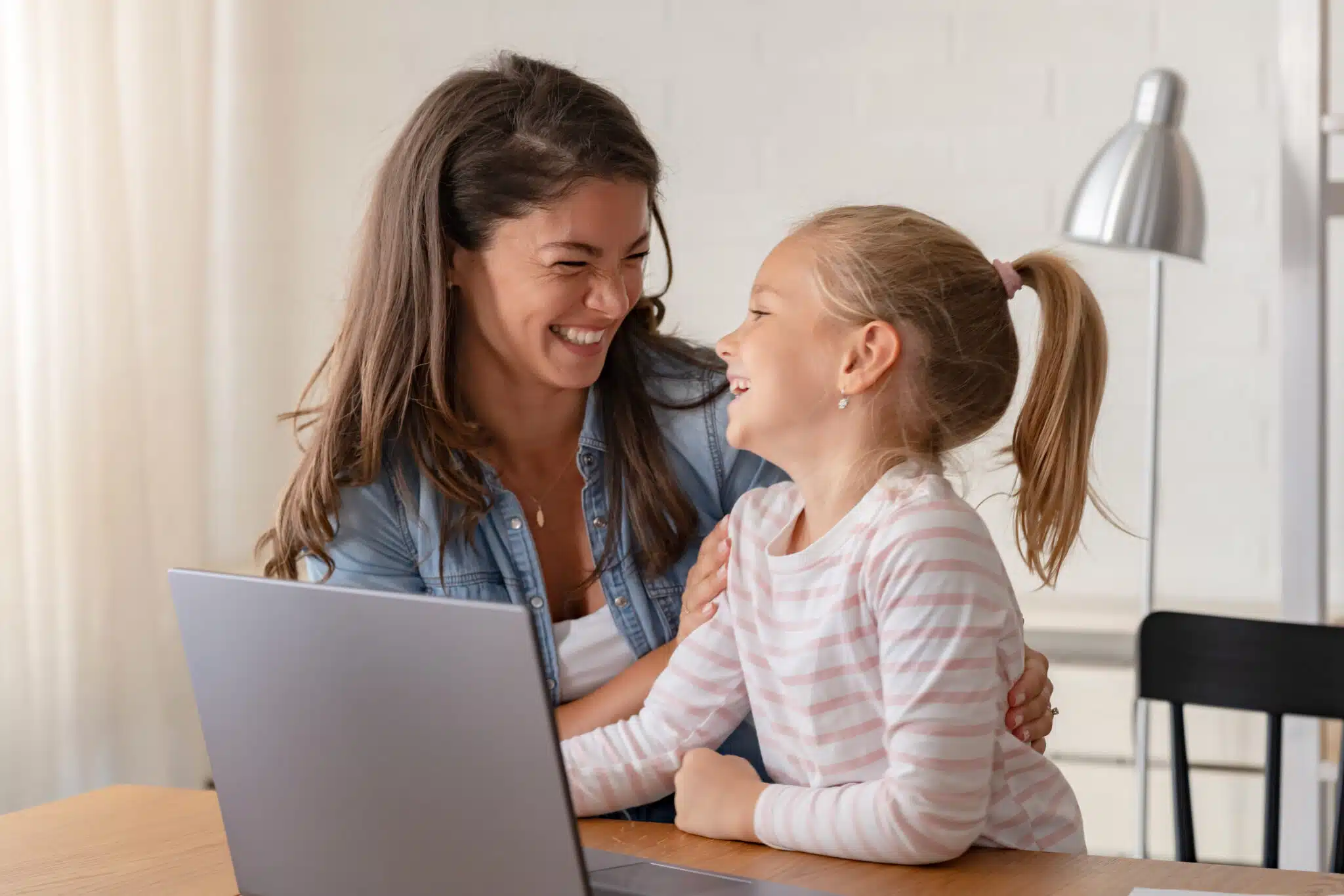 A cheerful mother and daughter, Air Filters .