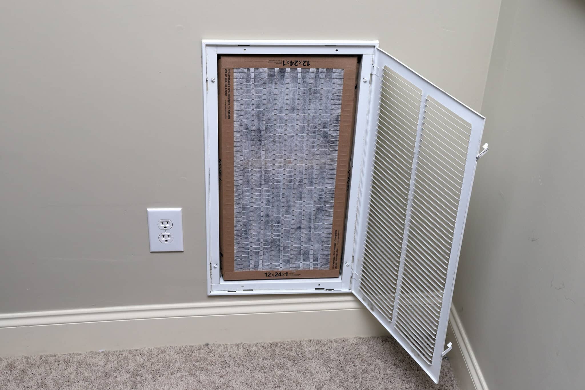 Replacing clean air filter for air conditioner maintenance, Dehumidifier Products.