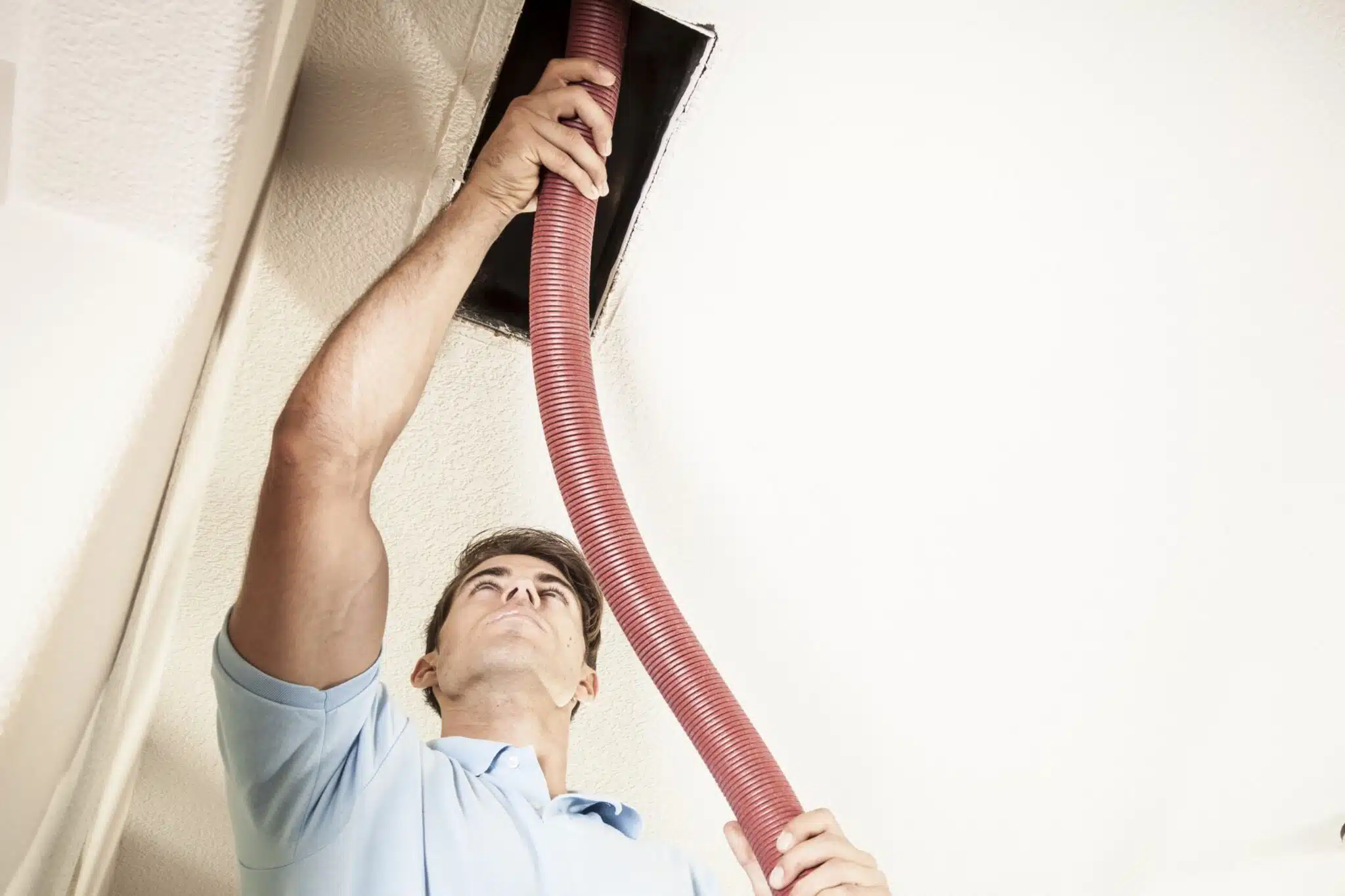 Cleaning air ducts in home, AC Services Near Me.